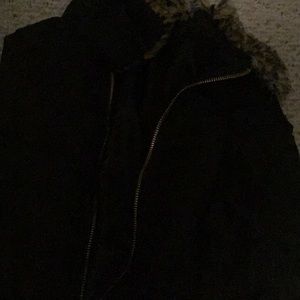 Black vest- Cheetah patterned at top